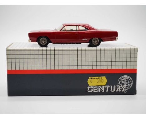 A BROOKLIN (CENTURY) hand built white metal, 1:43 scale model of a 1969 Plymouth GTX, VG in G box.