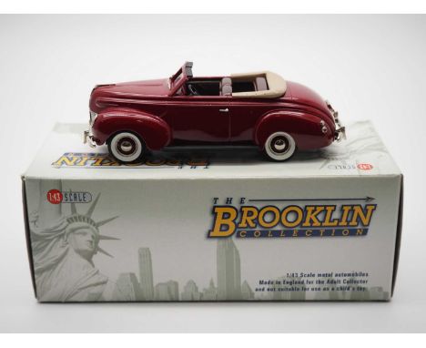 A BROOKLIN BRK.159 hand built white metal, 1:43 scale model of a 1939 Mercury Club convertible, VG/E in G/VG box.