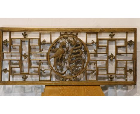 19th Century Chinese fretwork wooden panel with dragon and phoenix central motif, 49 x 112 cm. Not available for in-house P&a