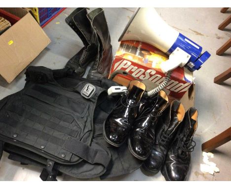 Pair Sanders black patent boots with spurs, size 11, two other pairs of black leather boots, three stab vests and a Pro Sound