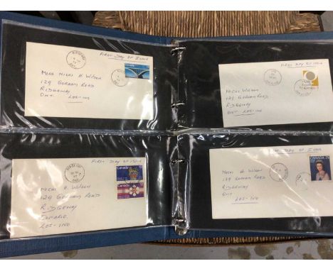 Album of first day covers and mint stamps