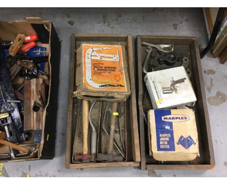 Group of various hand tools to include moulding planes, sash clamps, valve spring compressor and other items.