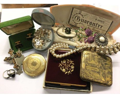 Vintage tobacco tin containing costume jewellery and bijouterie