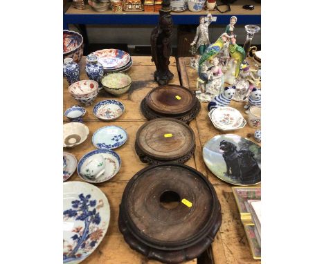 Three good carved wood Chinese stands and a Chinese carved wood figure converted to a lampCondition report: The internal diam