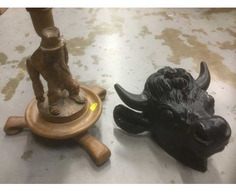 Carved wooden lamp, with Ally Soper type figure, and carved shade, together with a carved bulls headCondition report: Carved 