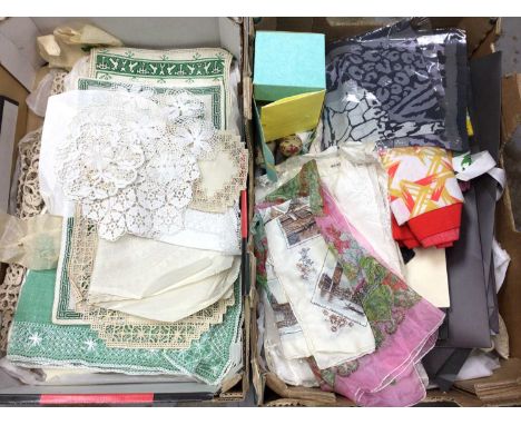 Two boxes of mixed vintage items including packaged ties, silk scarves, lingerie, lace, crochet and embroidered table linens 