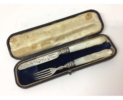 Victorian silver christening knife and fork with engraved decoration and carved mother o pearl handles ( Birmingham 1846) in 