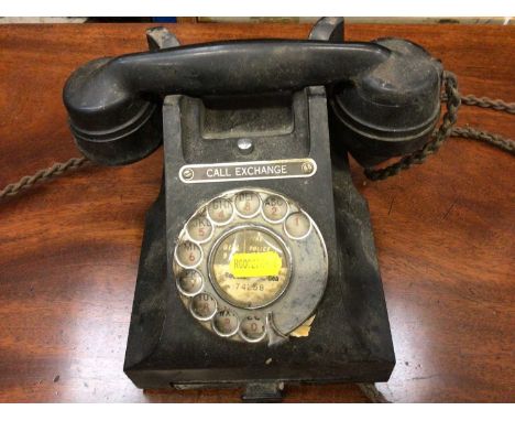 A black Bakelite vintage telephone