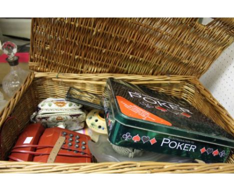 An F&M wicker hamper containing a selection of domestic items