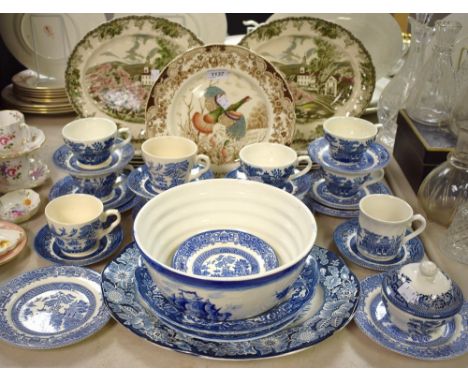 A set of twelve Johnson Bros. oval plates, The Friendly Village Series;  blue and white tableware including cups and saucers,