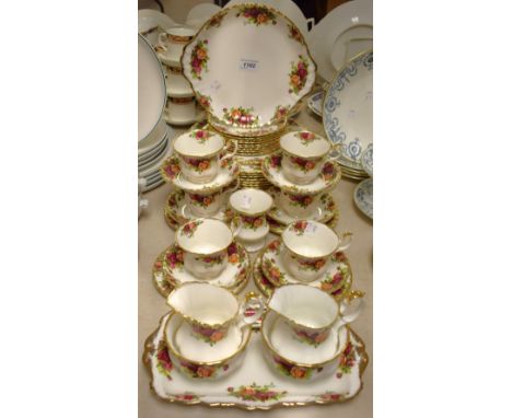 Royal Albert Old Country Roses - eight dinner plates, twelve side plates, two-tier cake stand, six tea ups and saucers, two s