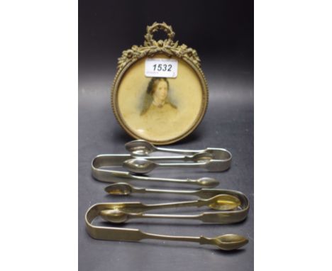 English School (19th century), portrait miniature of a Victorian matriarch, watercolour on paper, circle, gilt brass frame, r