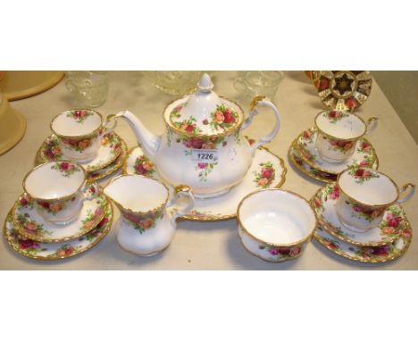 A Royal Albert Old Country Roses pattern tea set, comprising teapot, milk and sugar, four cups, saucers and tea plates, a bre