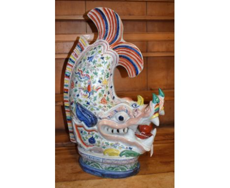 A large Chinse ceramic model, Mythological Sea Monster Water Dragon, decorated in the Famille Verte pallet, 67cm high, 41cm w