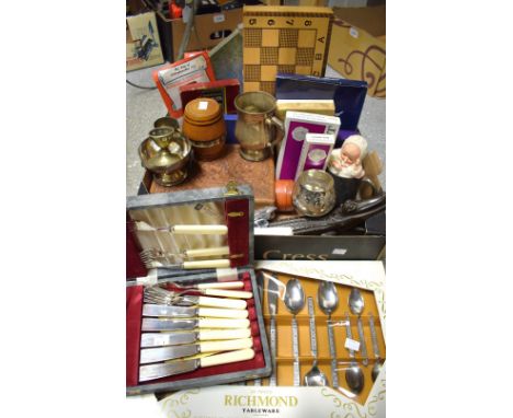 A novelty cast iron crocodile nut cracker; a games compendium; a carved hardwood box; photo frames; flatware, some boxed; a p