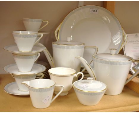 A Konigl pr. Tettau tea service for six;  Royal Doulton cup and saucers, Gold Concord