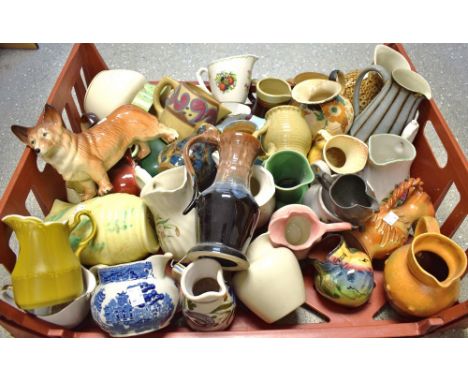 A Denby Studio pattern jug; other decorative ceramic jugs; slipware; Art Deco; pewter; a Melba ware model of a Corgi; quantit