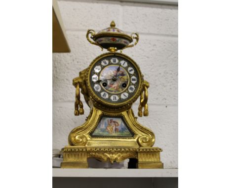 A good French ormolu and porcelain mantle clock.