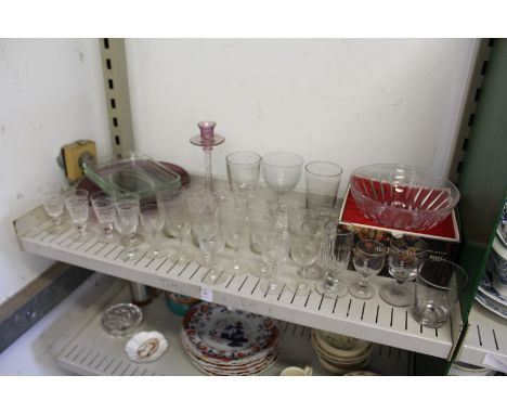 A shelf of glassware.