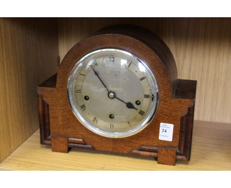 An oak mantle clock.