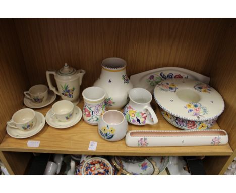 A quantity of Poole Pottery.