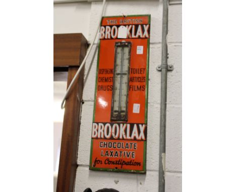 Brooklax, an enamel advertising sign with thermometer (lacking tube).