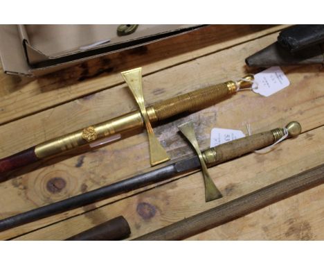 Toye &amp; Co Ltd. London, a Masonic sword, lacking scabbard, together with another Masonic sword with etched blade and scabb