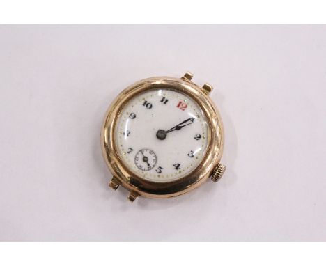 A 9ct gold and enamel ladies' wristwatch (lacking strap).
