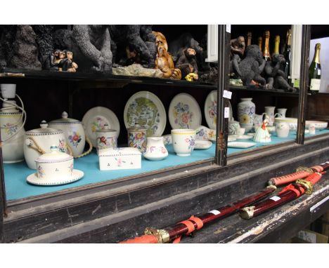 A large quantity of Poole Pottery items.