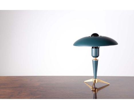 A DESK LAMP BY LOUIS KALFF FOR PHILIPS, EINDHOVEN, c.1950, raised on gilded metal feet, 34cm high.