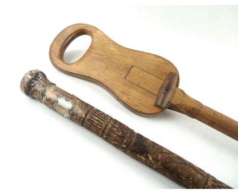 A wooden walking stick, with geometric banded decoration, fish and flowers, with white metal plaque, engraved 'To Major D Jac