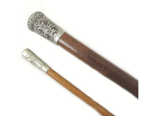 A WWII Sherwood Foresters - Derbyshire regiment walking cane, with white metal top with regiment badge, together with a swagg