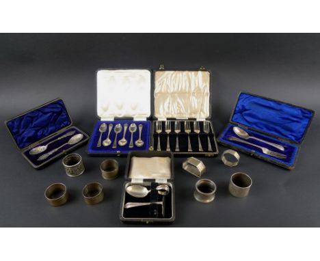 A large collection of silver including a set of six silver Old English pattern teaspoons, a set of six cake forks, a pair of 