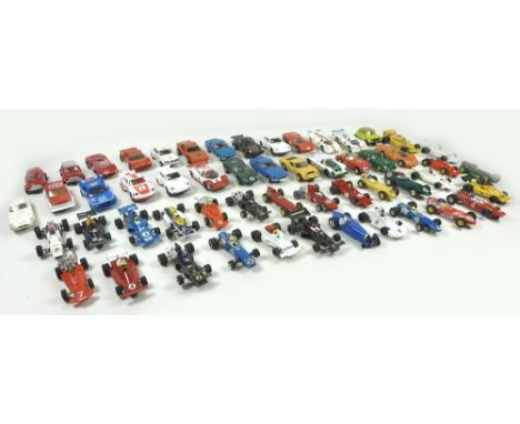 An extensive collection of Hornby Scalextric cars and track, including Dunlop Bridge, Startlight Gantry, both boxed and appro