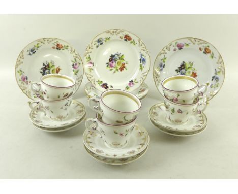 A Continental 19th century part tea set, comprising six cups, 11 by 7cm, six saucers, 14cm, all painted with floral sprays, p