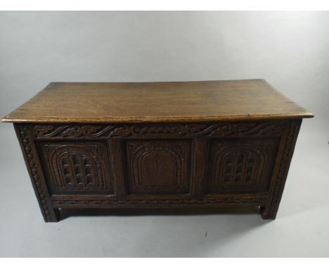 A 19th Century Oak Carved Three Panel Coffer