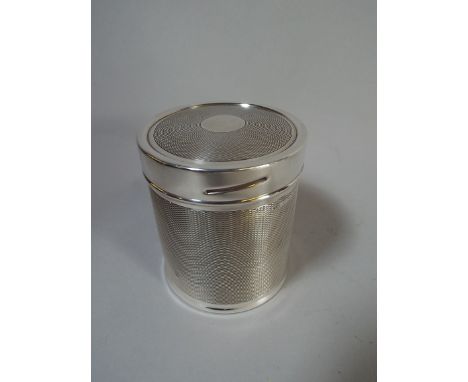 A Silver Cylindrical Cigarette Box with Engine Turned Decoration by Mappin and Webb, Sheffield 1933