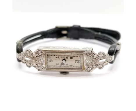 Art Deco platinum &amp; diamond cocktail watch on a black leather strap - manual wind movement in a 40mm long case and runnin