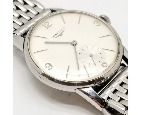 Longines 1960's stainless steel manual wind wristwatch (32mm case) with original winding crown and running (tested for 4 days