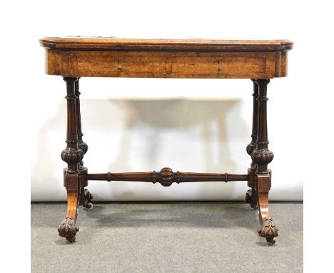 Victorian figured walnut and inlaid fold-over card table, the top with rounded ends, tooled leather inset (distressed), baize