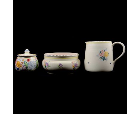 Three pieces of Poole Pottery including preserve pot and cover; a large jug; and a small bowl.Qty: 3