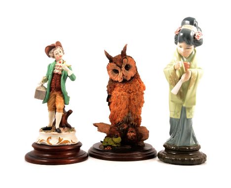 A collection of ceramics, Llado figure, Nao, Danbury Mint resin, two Doulton character jugs, Royal Worcester 'Monk' candle sn