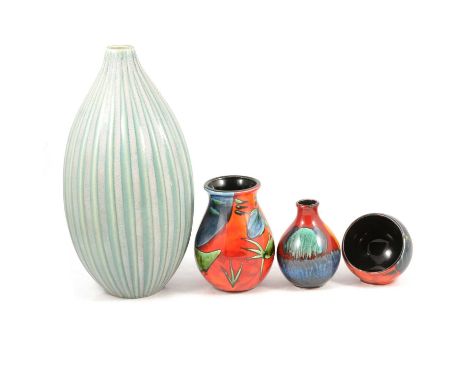 Four items of Poole Studio ware, including tall vase of swollen ribbed form, 37cm, and three modern Studio vases.Qty: 4Condit
