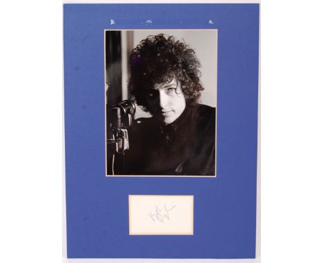 Bob Dylan - American Singer Songwriter - rare autographed album page, signed in blue ballpoint circa 1960's / 70's. Mounted b