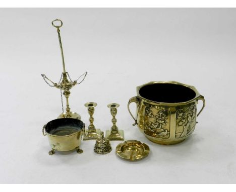A group of brasswares, 19th/20th Century, including a Chinese planter, a student type oil lamp, a pair of candlesticks, a sma
