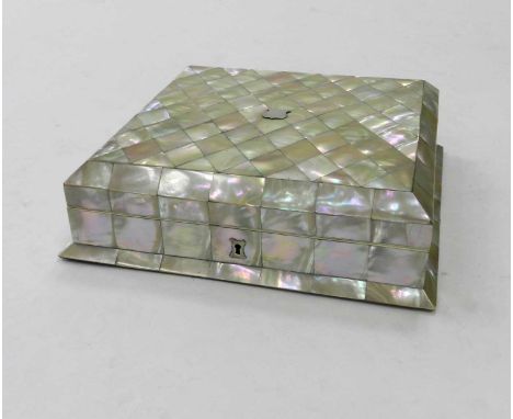 A mother of pearl jewel box, of near square form with canted top and foot, the lid with a white metal shield cartouche, 28cm 