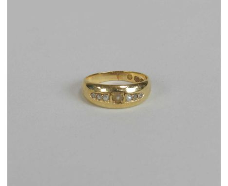 A late 19th century 18ct gold split pearl and diamond ring, designed as a central single split pearl flanked to each side by 