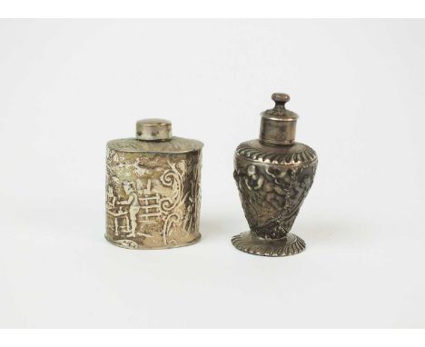 A 19th century Dutch silver miniature tea caddy, circa 1837, of oval form with embossed figural decoration, 4cm high, togethe