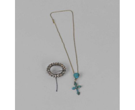 A 19th century turquoise set crucifix pendant, the chain set with turquoise set heart shaped toggle, together with a Georgian