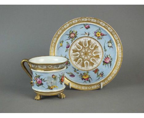 Two English porcelain cabinet cup and saucers, possibly Worcester circa 1820 of Etruscan shape, the cups raised on three paw 